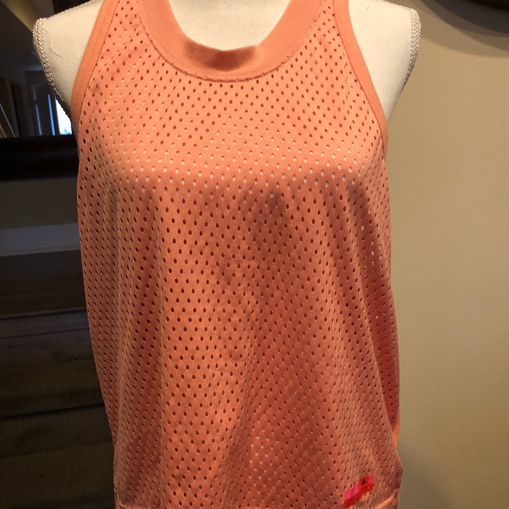 Stella McCartney perforated orange workout top